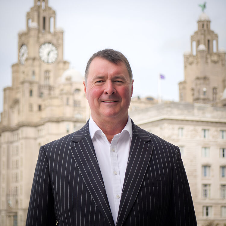 Dominic Farrell in front of the Royal Liver Building